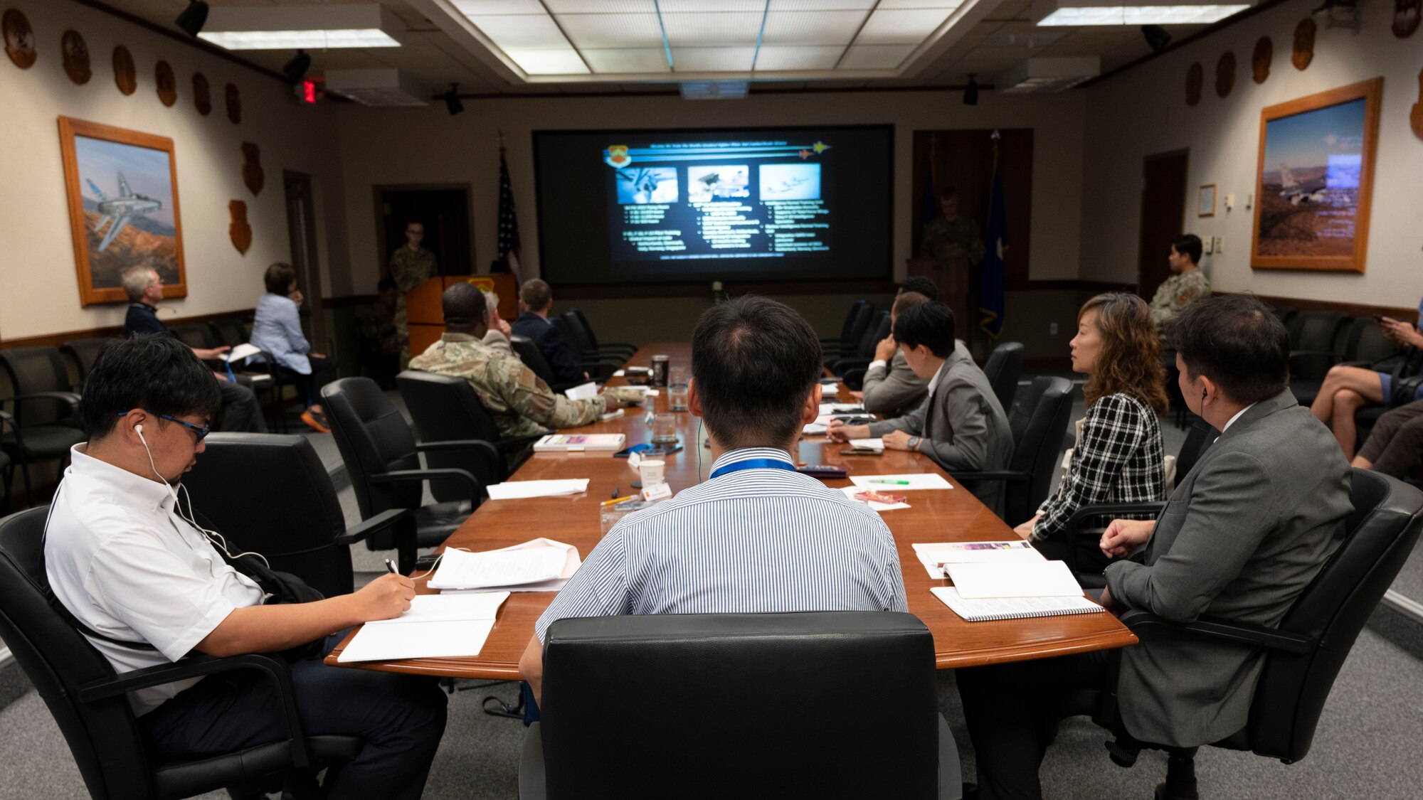 Japanese civic leaders part of the U.S. Department of State’s International Visitor Leadership Program listen to the 56th Fighter Wing mission brief at Luke Air Force Base, Arizona, on Aug. 2, 2023.
