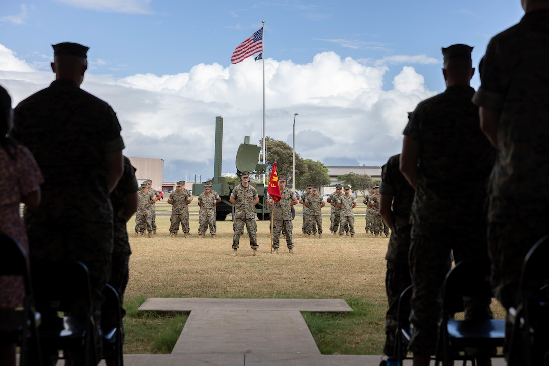 U.S. Marines with Mike Company, Marine Air Control Squadron 4, Marine Air Control Group 18, participate in a change of command ceremony, Marine Corps Base Hawaii, July 31, 2023. Capt. David Kimberling relinquished his duties as commanding officer of Mike Company to Capt. Vanessa Padilla. (U.S. Marine Corps photo by Lance Cpl. Clayton Baker)