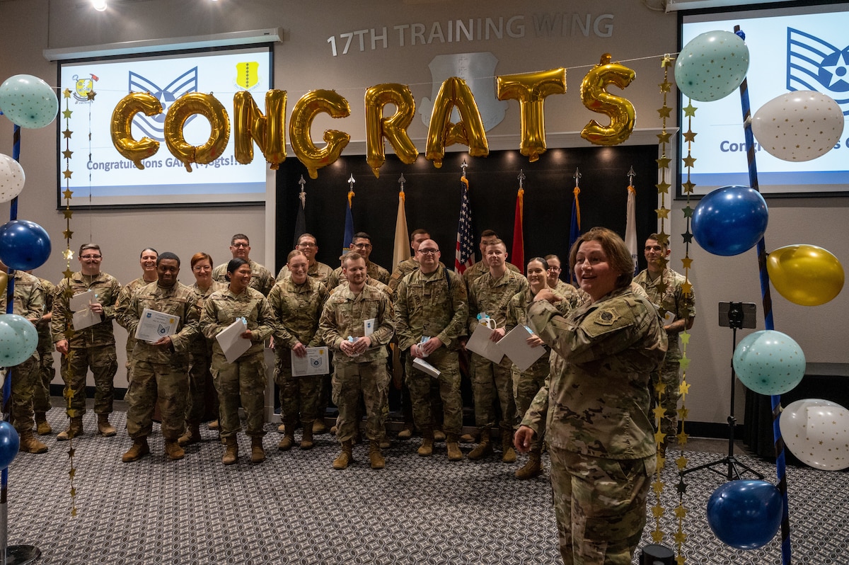 U.S. Air Force Col. Angelina Maguinness, 17th Training Wing commander congratulates promotees during the technical sergeant release party at the Powell Event Center, Goodfellow Air Force Base, Texas, Aug 3, 2023. Technical sergeants operate as technical experts in their career, serving as supervisors and ensuring proper and effective use of all resources under their control. (U.S. Air Force photo by Staff Sgt. Jermaine Ayers)