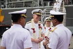 Commander, U.S. 7th Fleet Vice Adm. Karl Thomas is greeted by his Indonesian Navy (TNI-AL) counterparts at the welcoming reception in Jakarta, Indonesia, July 26. U.S. 7th Fleet, embarked aboard USS Blue Ridge (LCC 19), arrived in Jakarta for a port visit July 26 to participate in staff talks with counterparts of the Indonesian Navy (TNI-AL), conduct professional exchanges, and participate in community outreach. The port visit reflects the United States' commitment to the Indo-Pacific region and complements the many bilateral the many bilateral military cooperation activities conducted by the U.S. Navy and Indonesia.
