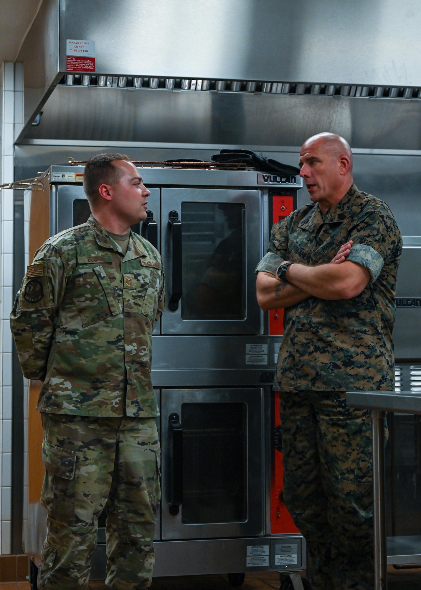 U.S. Marine Corps Sgt. Maj. Howard L. Kreamer, U.S. Strategic Command (USSTRATCOM) Senior Enlisted Leader, eats breakfast with noncommissioned officers at Minot Air Force Base, North Dakota, Aug. 2, 2023. During the breakfast, Kreamer answered questions about USSTRATCOM, and gave advice on how to enhance their leadership skills. (U.S. Air Force photo by Senior Airman Evan Lichtenhan)