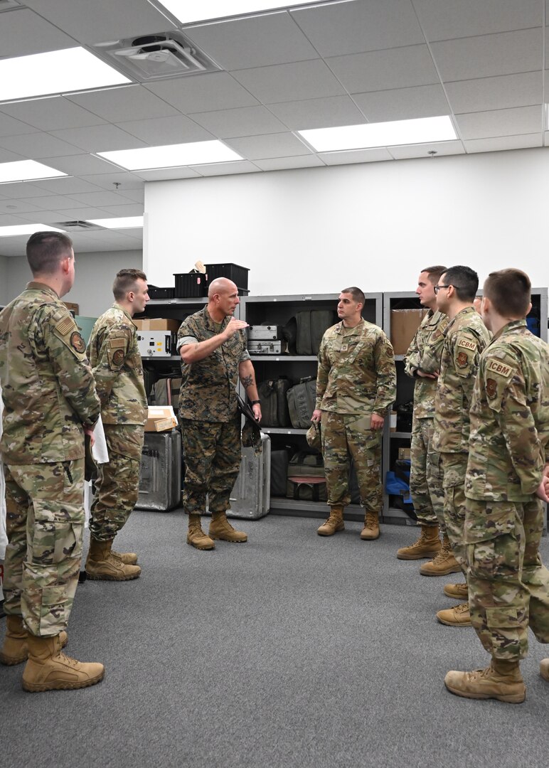 U.S. Marine Corps Sgt. Maj. Howard L. Kreamer, U.S. Strategic Command (USSTRATCOM) Senior Enlisted Leader, eats breakfast with noncommissioned officers at Minot Air Force Base, North Dakota, Aug. 2, 2023. During the breakfast, Kreamer answered questions about USSTRATCOM, and gave advice on how to enhance their leadership skills. (U.S. Air Force photo by Senior Airman Evan Lichtenhan)