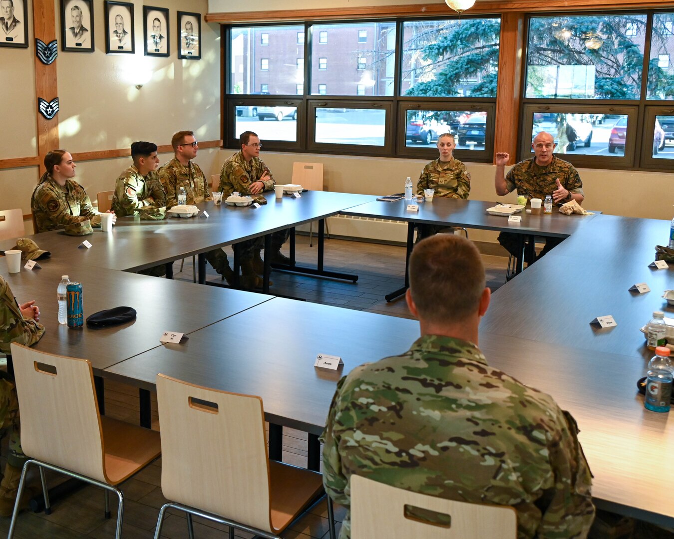 U.S. Marine Corps Sgt. Maj. Howard L. Kreamer, U.S. Strategic Command (USSTRATCOM) Senior Enlisted Leader, eats breakfast with noncommissioned officers at Minot Air Force Base, North Dakota, Aug. 2, 2023. During the breakfast, Kreamer answered questions about USSTRATCOM, and gave advice on how to enhance their leadership skills. (U.S. Air Force photo by Senior Airman Evan Lichtenhan)