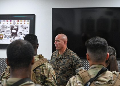 U.S. Marine Corps Sgt. Maj. Howard L. Kreamer, U.S. Strategic Command (USSTRATCOM) Senior Enlisted Leader, eats breakfast with noncommissioned officers at Minot Air Force Base, North Dakota, Aug. 2, 2023. During the breakfast, Kreamer answered questions about USSTRATCOM, and gave advice on how to enhance their leadership skills. (U.S. Air Force photo by Senior Airman Evan Lichtenhan)