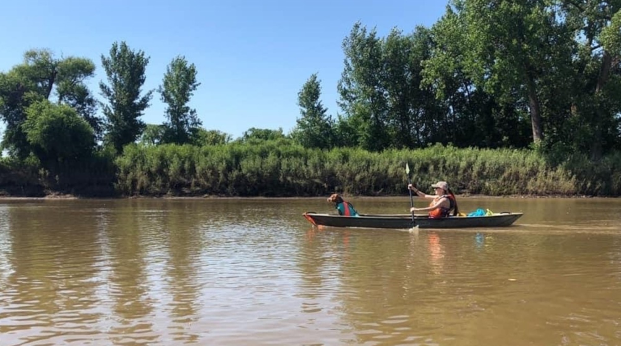 Madison Ecklund, 412th Force Support Squadron recreation assistant kayaks with her dog on an expedition to Canada in 2022. Ecklund was 1 of 7 people in the world to successfully accomplish a 1,500-mile solo kayak expedition from Minneapolis, Minnesota, USA, to York Factory, Manitoba, Canada last year.