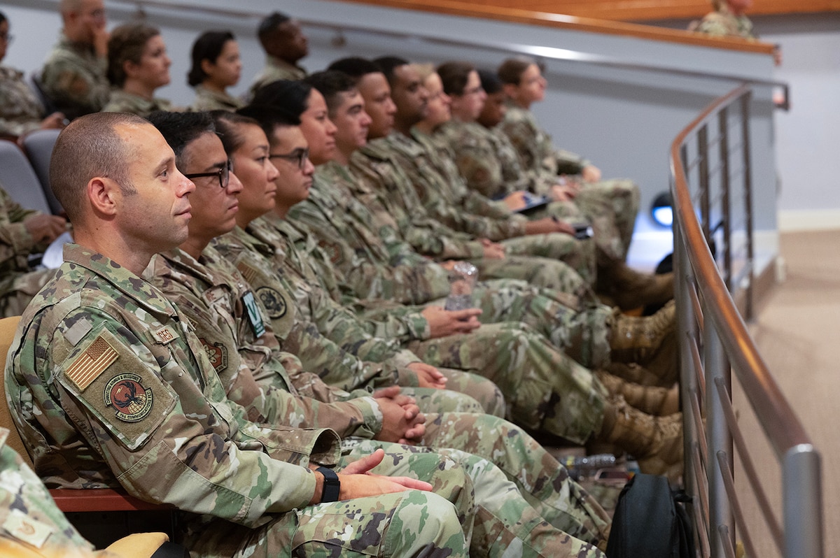 U.S. Air Force Airmen from across the Air National Guard listen to a guest speaker during the 2023 ANG Enlisted Leadership Symposium, Alexandria, Virginia, Aug. 4, 2023.