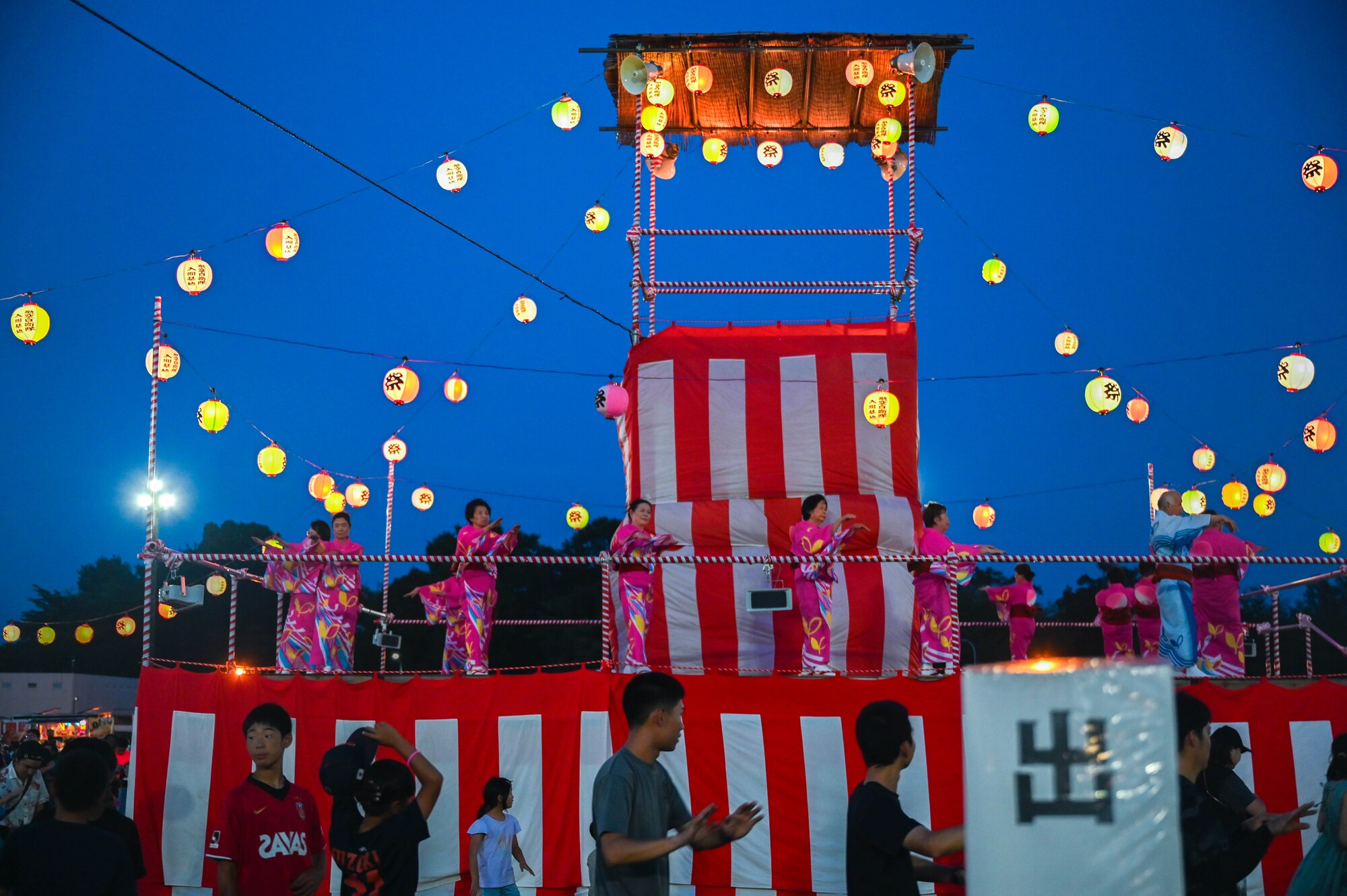 Bon Odori dancers perform a dance during a festival