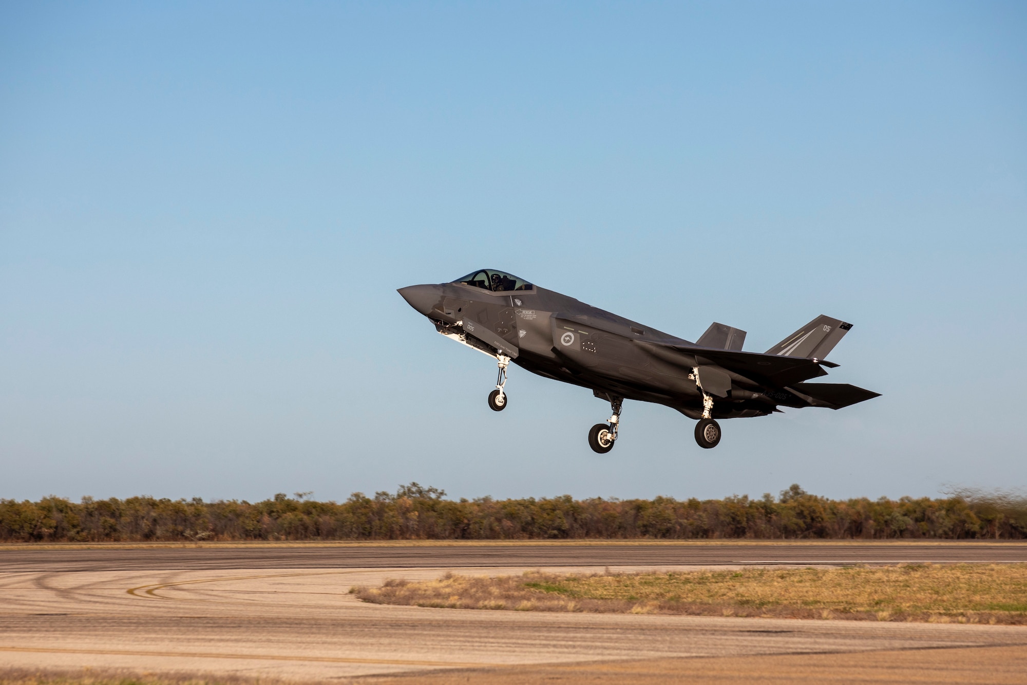 A Royal Australian Air Force F-35A Lightning ll takes off from RAAF Base Curtin, Western Australia, during Exercise Talisman Sabre 2023. Talisman Sabre is a bilateral exercise that helps build and maintain trust and interoperability among key allies through shared experiences and tough, realistic training. (Royal Australian Air Force photo by LACW Annika Smit)
