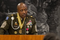 Command Sgt. Maj. Kenneth F. Law, U.S. Army Financial Management Command senior enlisted advisor, delivers remarks during his retirement ceremony at the Maj. Gen. Emmett J. Bean Federal Center in Indianapolis March 31, 2023. Law retired from active duty after more than 30 years of service. (U.S. Army photo by Mark R. W. Orders-Woempner)