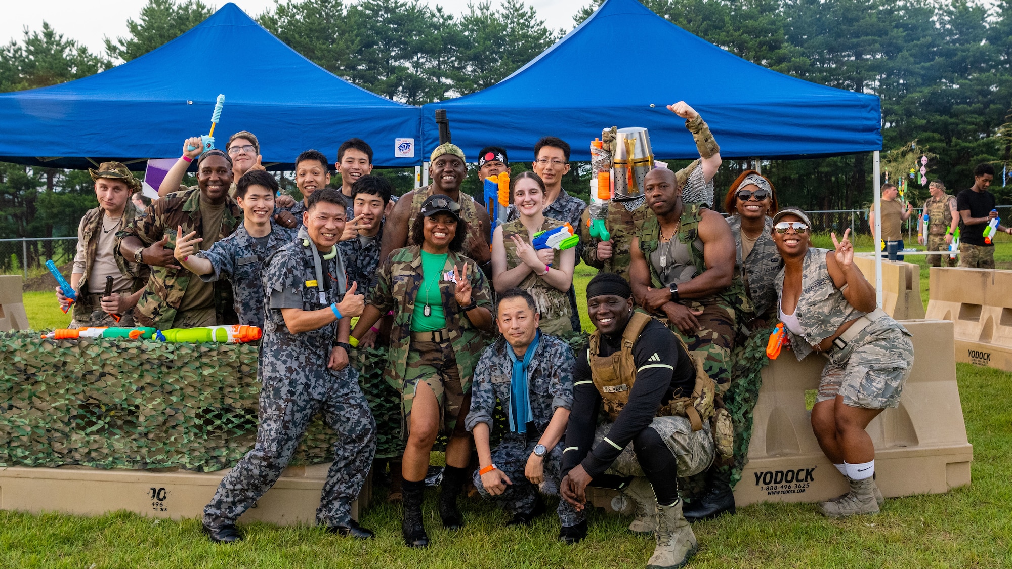 Members of Team Misawa pose together prior to Misawa’s first joint enlisted bilateral combat dining-in event at Misawa Air Base, Japan, July 28, 2023.