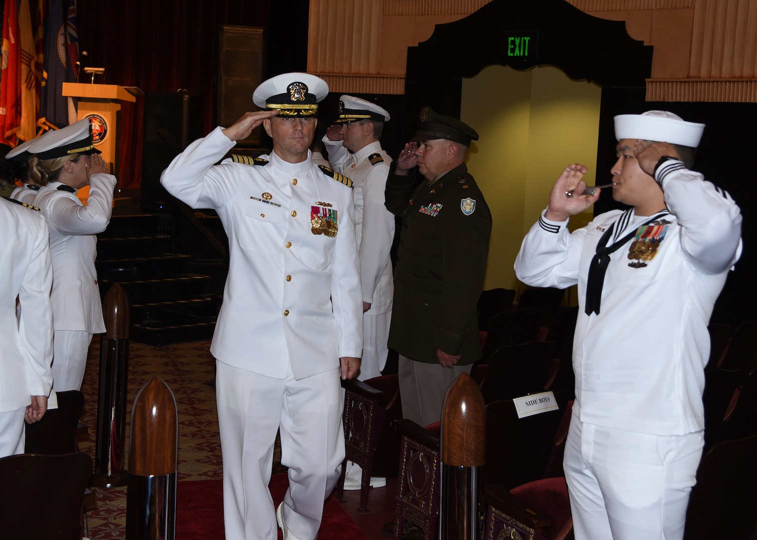 JOINT BASE SAN ANTONIO-FORT SAM HOUSTON – (Aug. 4, 2023) – Capt. Gerald DeLong, Medical Service Corps (MSC), of Belvidere, Ill., former commanding officer of Naval Medical Research Unit (NAMRU) San Antonio, is “Piped Ashore” at the conclusion of a Change of Command Ceremony held at the Fort Sam Houston Theatre. Commanding NAMRU San Antonio since May 2021, DeLong took command during the COVID-19 pandemic with limited and or suspended research projects with less than 50 percent facilities occupancy for unit personnel.  DeLong led the command out of the pandemic and into full operations while regaining the confidence of research sponsors. NAMRU San Antonio’s mission is to conduct gap driven combat casualty care, craniofacial, and directed energy research to improve survival, operational readiness, and safety of Department of Defense (DoD) personnel engaged in routine and expeditionary operations. It is one of the leading research and development laboratories for the U.S. Navy under the DoD and is one of eight subordinate research commands in the global network of laboratories operating under NMRC in Silver Spring, Md. (U.S. Navy photo by Burrell Parmer, NAMRU San Antonio Public Affairs/Released)