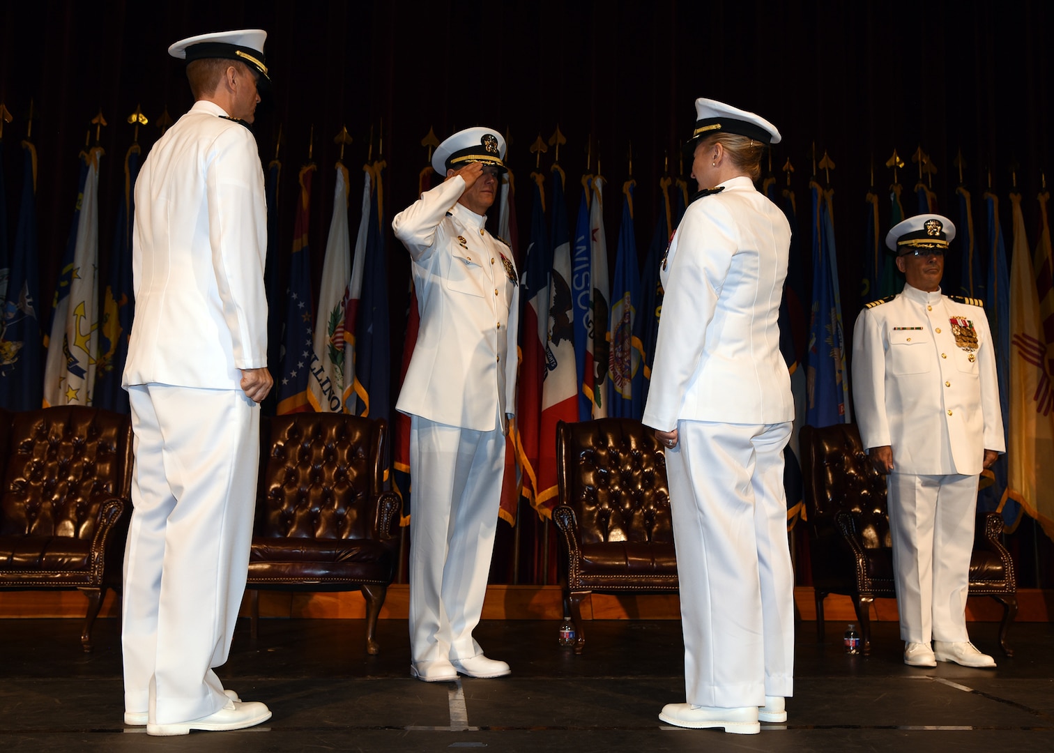 JOINT BASE SAN ANTONIO-FORT SAM HOUSTON – (Aug. 4, 2023) – Capt. Jennifer Buechel, Nurse Corps, of Woodhaven, Mich., assumed command of Naval Medical Research Unit (NAMRU) San Antonio from Capt. Gerald DeLong, Medical Service Corps (MSC), of Belvidere, Ill., during a Change of Command Ceremony held at the Fort Sam Houston Theatre.  Presiding over the ceremony was Capt. William Deniston, MSC, commander, Naval Medical Research Command (NMRC). NAMRU San Antonio’s mission is to conduct gap driven combat casualty care, craniofacial, and directed energy research to improve survival, operational readiness, and safety of Department of Defense (DoD) personnel engaged in routine and expeditionary operations. It is one of the leading research and development laboratories for the U.S. Navy under the DoD and is one of eight subordinate research commands in the global network of laboratories operating under NMRC in Silver Spring, Md. (U.S. Navy photo by Burrell Parmer, NAMRU San Antonio Public Affairs/Released)
