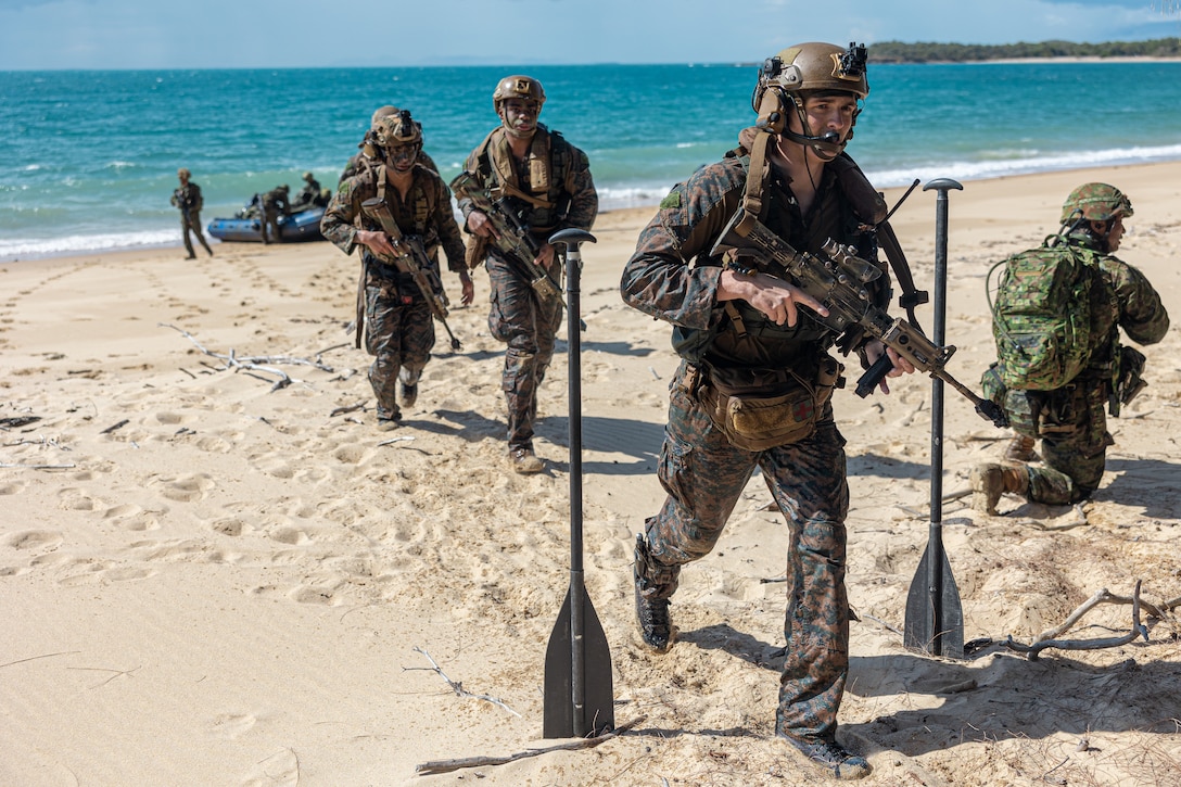 U.S. Marines with Battalion Landing Team 2/1, 31st Marine Expeditionary Unit, utilize combat rubber raiding craft for transit during an amphibious assault with the 1st Amphibious Rapid Deployment Regiment, Japan Ground Self-Defense Force in the Coral Sea, Aug. 2, during Exercise Talisman Sabre 23. The amphibious assault demonstrated how Marines can deploy rapidly across all domains while supporting a wide range of missions. Talisman Sabre is the largest bilateral military exercise between Australia and the United States advancing a free and open Indo-Pacific by strengthening relationships and interoperability among key allies and enhancing our collective capabilities to respond to a wide array of potential security concerns.