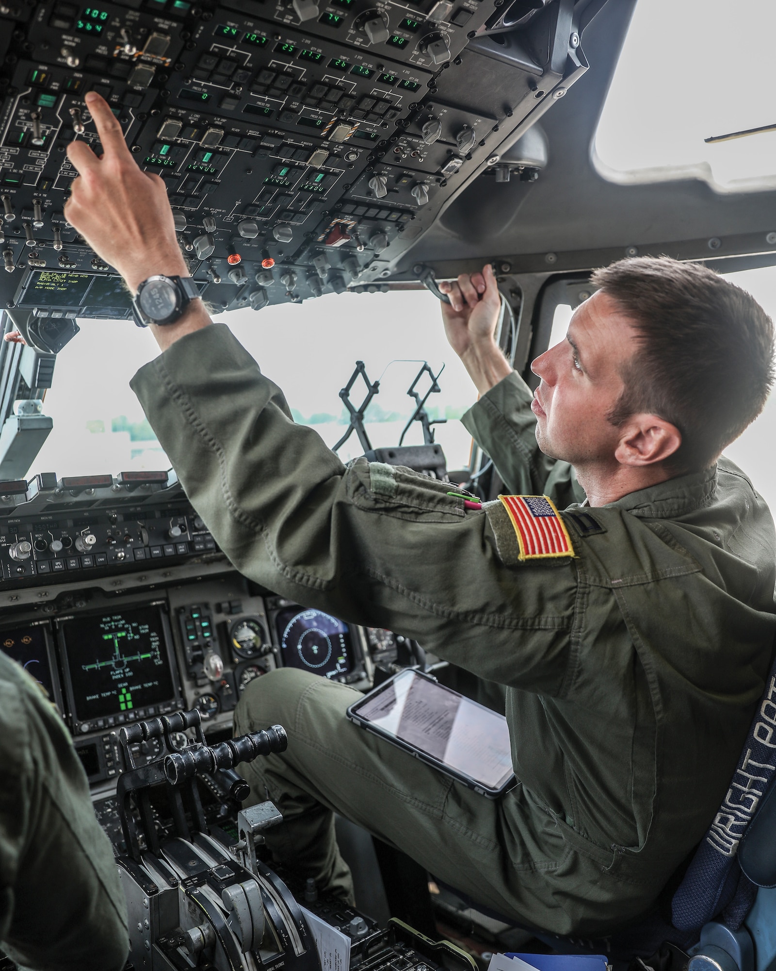 U.S. Air Force Capt. Matthew Bush, 89th Airlift Squadron C-17 pilot and aircraft commander, performs pre-flight checks on a C-17 Globemaster III prior to take-off on a routine flight at Wright-Patterson Air Force Base, Ohio, July 19, 2023. (U.S. Air Force photo by Master Sgt. Patrick O’Reilly)