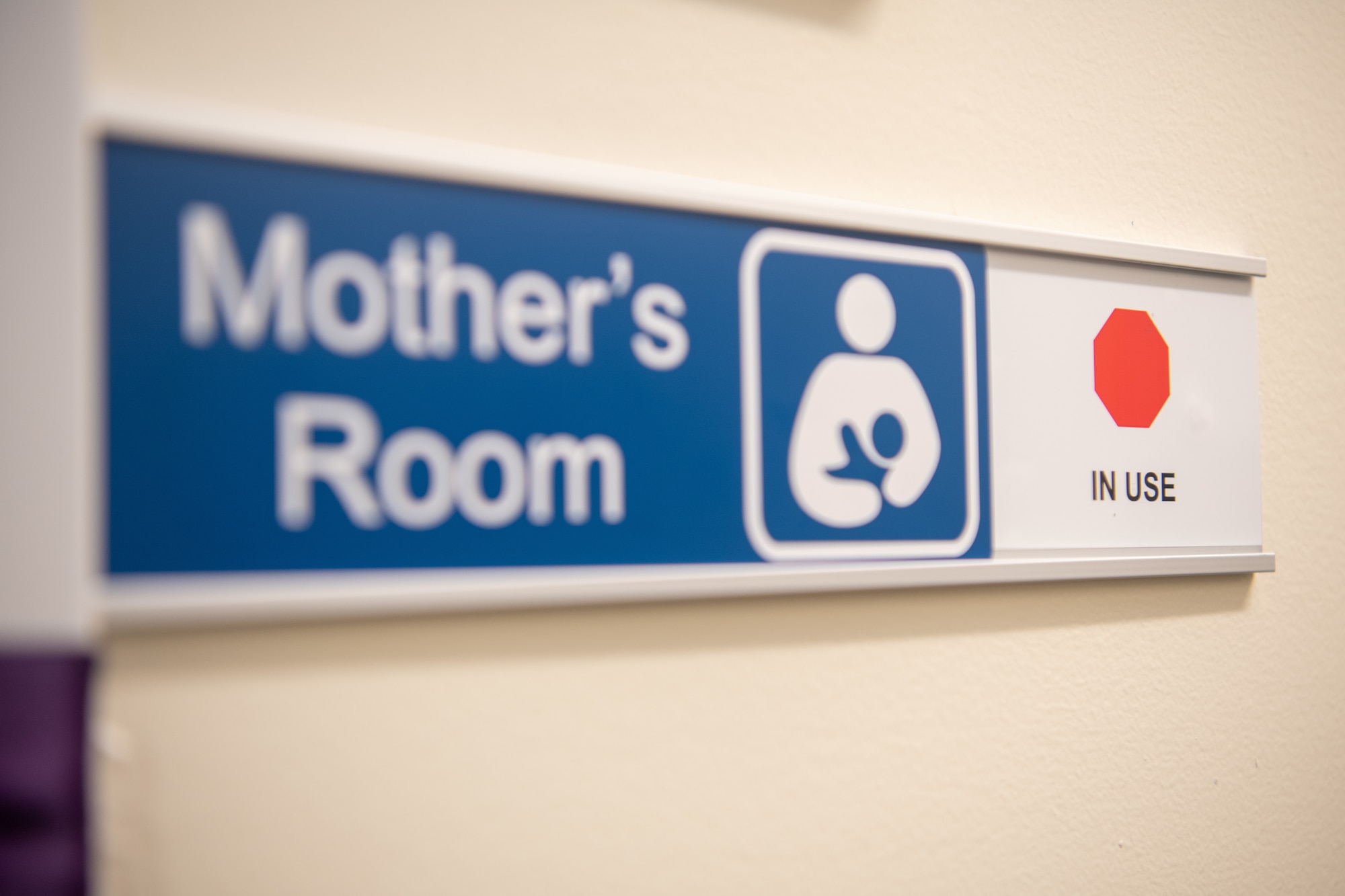 Mother's Room sign showing in use.