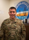 U.S. Air Force Tech. Sgt. Kyle Morales, 628th Air Base Wing Command Post command-and-control operations, explains the intricacies of working within the command post at Joint Base Charleston, South Carolina, July 27, 2023.
