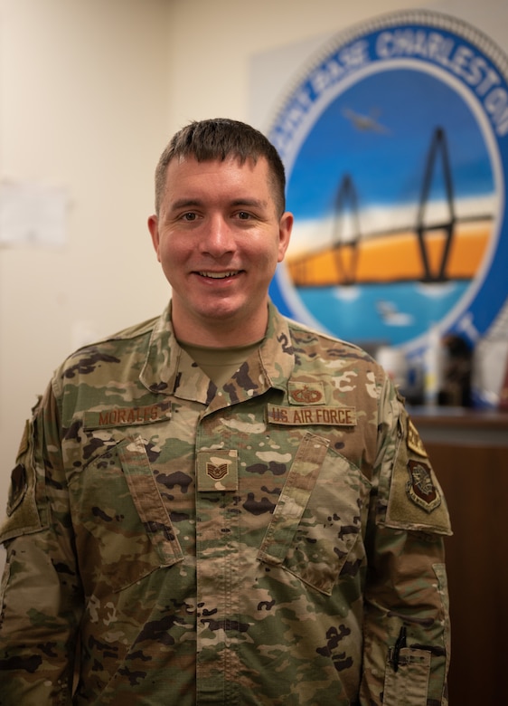 U.S. Air Force Tech. Sgt. Kyle Morales, 628th Air Base Wing Command Post command-and-control operations, explains the intricacies of working within the command post at Joint Base Charleston, South Carolina, July 27, 2023.