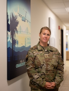 U.S. Air Force Tech. Sgt. Britney Murray, 628th Air Base Wing Command Post command-and-control operations NCO-in-charge of quality assurance, highlights the success of her Airmen within command post at Joint Base Charleston, South Carolina, July 27, 2023.