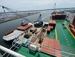 Salvage and post fire recovery operations continue at an efficient pace on the Grande Costa D’Avorio as crews work to safely transfer vehicles and cargo from the vessel to the port facility. To date, all vehicles have been removed from the cargo decks of the ship, as well as all 134 freestanding containers that were located beyond the area affected by the fire. (U.S. Coast Guard courtesy photo)