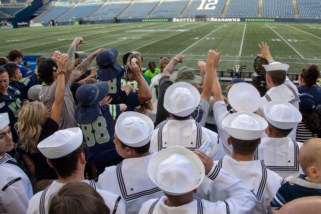 SEATTLE (Aug. 4, 2023) Sailors, assigned to the Arleigh Burke-class guided missile destroyer USS Barry (DDG 52) attend the 2023 Seattle Seahawks Football Fest during Seattle Fleet Week. Seattle Fleet Week is a time-honored celebration of the sea services and provides an opportunity for the citizens of Washington to meet Sailors, Marines and Coast Guardsmen, as well as witness firsthand the latest capabilities of today’s U.S. and Canadian maritime services. (U.S. Navy photo by Mass Communication Specialist 2nd Class Madison Cassidy)