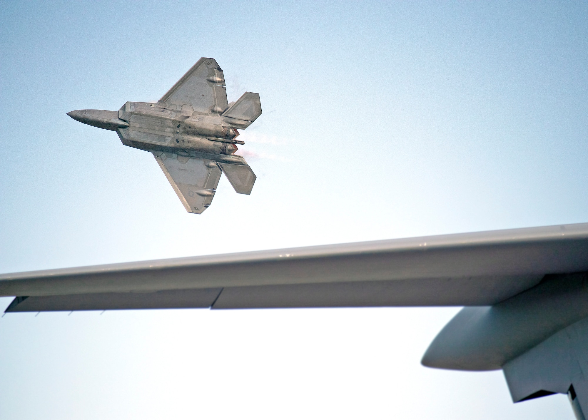 F-22 Raptor flies over static display at EAA AirVenture 2023