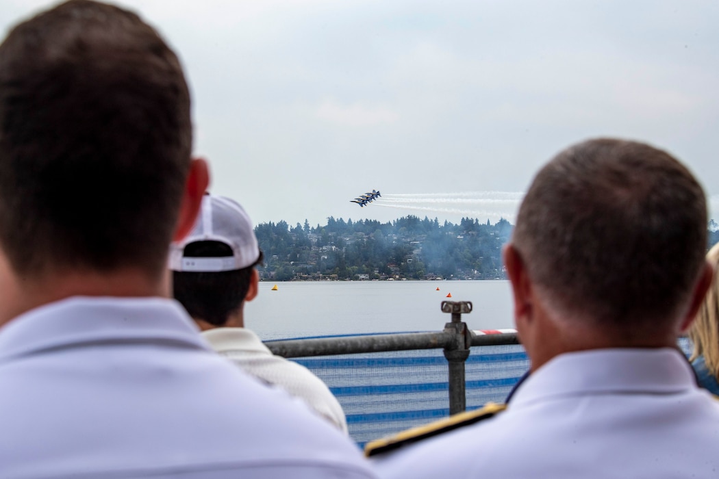 230805-N-YF131-1106 SEATTLE (Aug. 5, 2023) Vice Adm. Michael Boyle, commander, U.S. 3rd Fleet, right, watches the U.S. Navy Flight Demonstration Squadron, the Blue Angels, perform at Lake Washington during Seattle Fleet Week. Seattle Fleet Week is a time-honored celebration of the sea services and provides an opportunity for the citizens of Washington to meet Sailors, Marines and Coast Guardsmen, as well as witness firsthand the latest capabilities of today’s U.S. and Canadian maritime services. (U.S. Navy photo by Mass Communication Specialist 2nd Class Madison Cassidy)