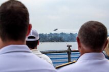 230805-N-YF131-1106 SEATTLE (Aug. 5, 2023) Vice Adm. Michael Boyle, commander, U.S. 3rd Fleet, right, watches the U.S. Navy Flight Demonstration Squadron, the Blue Angels, perform at Lake Washington during Seattle Fleet Week. Seattle Fleet Week is a time-honored celebration of the sea services and provides an opportunity for the citizens of Washington to meet Sailors, Marines and Coast Guardsmen, as well as witness firsthand the latest capabilities of today’s U.S. and Canadian maritime services. (U.S. Navy photo by Mass Communication Specialist 2nd Class Madison Cassidy)