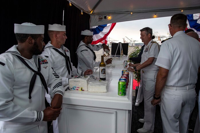 230805-N-YF131-1324 SEATTLE (Aug. 5, 2023) Sailors, assigned to the Arleigh burke-class guided-missile destroyer USS Barry (DDG 52), serve guests at the Seattle Fleet Week closing reception. Seattle Fleet Week is a time-honored celebration of the sea services and provides an opportunity for the citizens of Washington to meet Sailors, Marines and Coast Guardsmen, as well as witness firsthand the latest capabilities of today’s U.S. and Canadian maritime services. (U.S. Navy photo by Mass Communication Specialist 2nd Class Madison Cassidy)