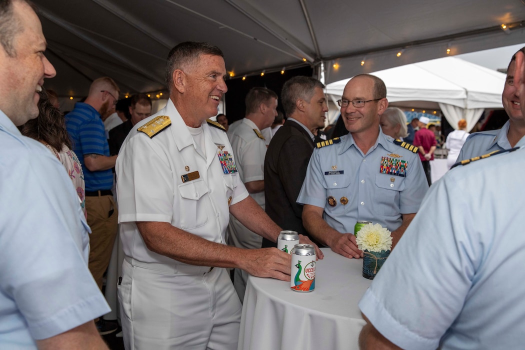 230805-N-YF131-1332 SEATTLE (Aug. 5, 2023) Vice Adm. Michael Boyle, commander, U.S. 3rd Fleet, center, speaks with Coast Guardsmen at the Seattle Fleet Week closing reception hosted by the Arleigh burke-class guided-missile destroyer USS Barry (DDG 52). Seattle Fleet Week is a time-honored celebration of the sea services and provides an opportunity for the citizens of Washington to meet Sailors, Marines and Coast Guardsmen, as well as witness firsthand the latest capabilities of today’s U.S. and Canadian maritime services. (U.S. Navy photo by Mass Communication Specialist 2nd Class Madison Cassidy)