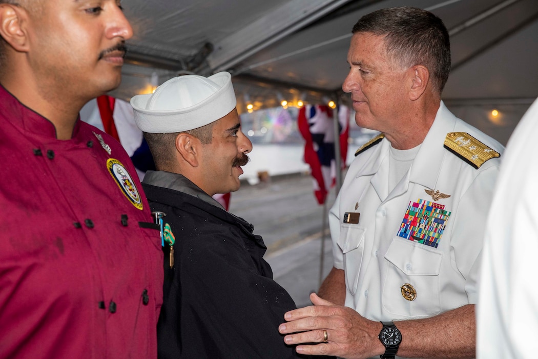 230805-N-YF131-1370 SEATTLE (Aug. 5, 2023) Vice Adm. Michael Boyle, commander, U.S. 3rd Fleet, right, awards the Navy Achievement Medal to Sailors at the Seattle Fleet Week closing reception hosted by the Arleigh burke-class guided-missile destroyer USS Barry (DDG 52). Seattle Fleet Week is a time-honored celebration of the sea services and provides an opportunity for the citizens of Washington to meet Sailors, Marines and Coast Guardsmen, as well as witness firsthand the latest capabilities of today’s U.S. and Canadian maritime services. (U.S. Navy photo by Mass Communication Specialist 2nd Class Madison Cassidy)