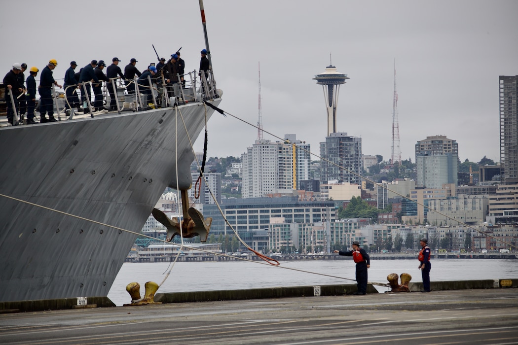 SEATTLE (Aug. 7, 2023) Coast Guardsmen assist Sailors assigned to the Arleigh Burke-class guided missile destroyer USS Barry (DDG 52) as they depart Seattle Fleet Week. Seattle Fleet Week is a time-honored celebration of the sea services and provides an opportunity for the citizens of Washington to meet Sailors, Marines and Coast Guardsmen, as well as witness firsthand the latest capabilities of today’s U.S. and Canadian maritime services. (U.S. Navy photo by Mass Communication Specialist 2nd Class Madison Cassidy)