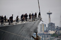 SEATTLE (Aug. 7, 2023) Sailors, assigned to the Arleigh Burke-class guided missile destroyer USS Barry (DDG 52) handle lines while departing Seattle Fleet Week. Seattle Fleet Week is a time-honored celebration of the sea services and provides an opportunity for the citizens of Washington to meet Sailors, Marines and Coast Guardsmen, as well as witness firsthand the latest capabilities of today’s U.S. and Canadian maritime services. (U.S. Navy photo by Mass Communication Specialist 2nd Class Madison Cassidy)