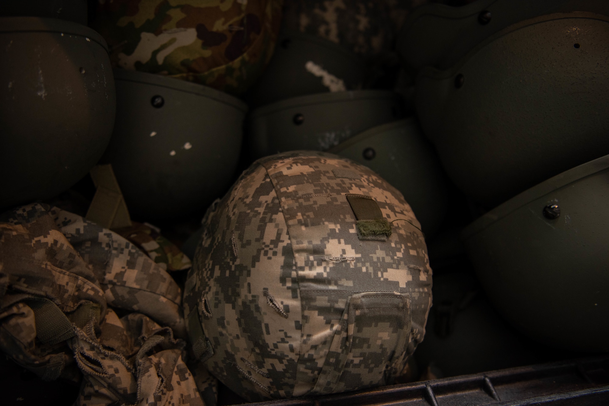 A helmet sits in container.