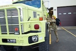 Alaska Air National Guard Staff Sgt. Anthony Hartman, 176th Civil Engineer Squadron firefighter, prepares to deploy from Joint Base Elmendorf-Richardson to Interior Alaska Aug. 6, 2023, to fight wildfires.