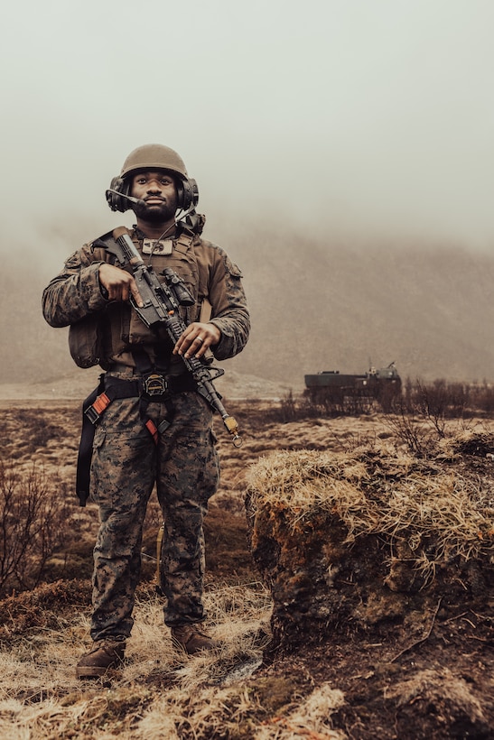 U.S. Marine Corps Cpl. Keithshawn Bailey, a Bridgeport, Connecticut, native and a high mobility artillery rocket system crew chief with Hotel Battery, 2nd Battalion, 10th Marine Regiment, 2d Marine Division, under tactical control of Task Force 61/2 poses for a photo during Formidable Shield in Andoya, Norway on May 10, 2023. “Being a part of Hotel Battery has done a lot for me as an NCO, as a Marine, and as a man. I have been extremely fortunate to have good people around me at all levels: staff ncos, officers, and junior Marines.” said Bailey. “They’re a big part of why I re-enlisted.” Formidable Shield is a biennial, integrated air and missile defense (IAMD) exercise involving a series of live-fire events against subsonic, supersonic, and ballistic targets, incorporating multiple Allied ships, aircraft, and ground forces working across battlespaces to deliver effects. (U.S. Marine Corps photo by Lance Cpl. Emma Gray)