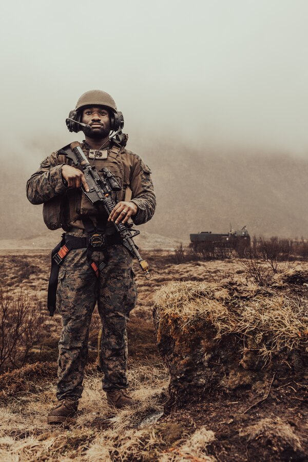 U.S. Marine Corps Cpl. Keithshawn Bailey, a Bridgeport, Connecticut, native and a high mobility artillery rocket system crew chief with Hotel Battery, 2nd Battalion, 10th Marine Regiment, 2d Marine Division, under tactical control of Task Force 61/2 poses for a photo during Formidable Shield in Andoya, Norway on May 10, 2023. “Being a part of Hotel Battery has done a lot for me as an NCO, as a Marine, and as a man. I have been extremely fortunate to have good people around me at all levels: staff ncos, officers, and junior Marines.” said Bailey. “They’re a big part of why I re-enlisted.” Formidable Shield is a biennial, integrated air and missile defense (IAMD) exercise involving a series of live-fire events against subsonic, supersonic, and ballistic targets, incorporating multiple Allied ships, aircraft, and ground forces working across battlespaces to deliver effects. (U.S. Marine Corps photo by Lance Cpl. Emma Gray)