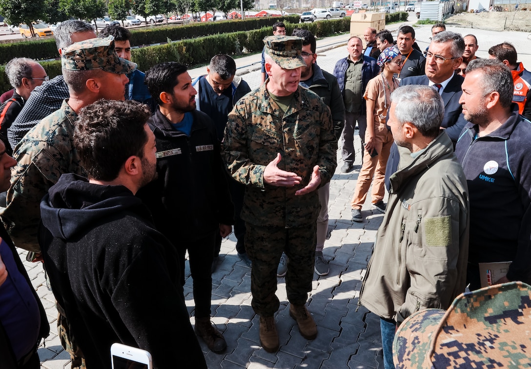 Brigadier Gen. Andrew T. Priddy, commanding general, Task Force 61/2 (TF 61/2) meet with members of the Turkish Ministry of Health, at Antakya, Türkiye, March 2, 2023. At the request of the Turkish government, U.S. military personnel assigned to Task Force 61/2 and 39th Air Base Wing were tasked with building a field hospital for the citizens who were affected by the Feb. 6 earthquakes. Upon completion of their efforts on March 2, 2023, leaders from Task Force 61/2 (TF 61/2), and 39th Air Base Wing conducted a final walk-through before the Turkish Ministry of Health began operations at the field hospital. (U.S. Marine Corps photo by Sgt. James Bourgeois/Released) Corps photo by Sgt. James Bourgeois/Released)