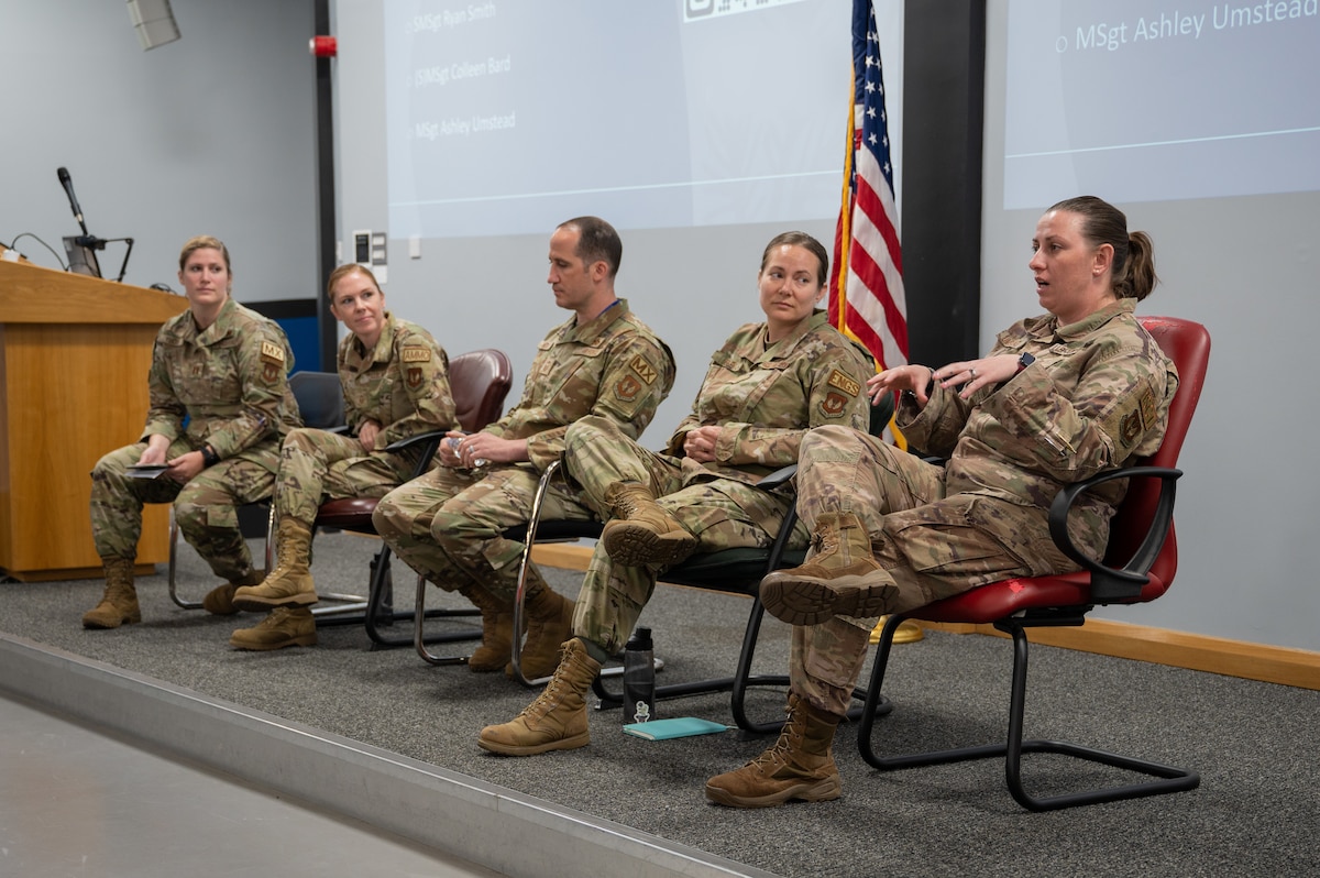 U.S. Air Force Master Sgt. Ashley Umstead, 494th Fighter Generation Squadron first sergeant, answers a question during a Supporting Women In Maintenance professional development event at RAF Lakenheath, England, August 4, 2023. A panel of 48th Maintenance Group leaders discussed existing barriers between female peers and supervision, navigating emotional responses and advocating for yourself as a woman in maintenance. (U.S. Air Force photo by Airman 1st Class Renee Nicole S.N. Finona)