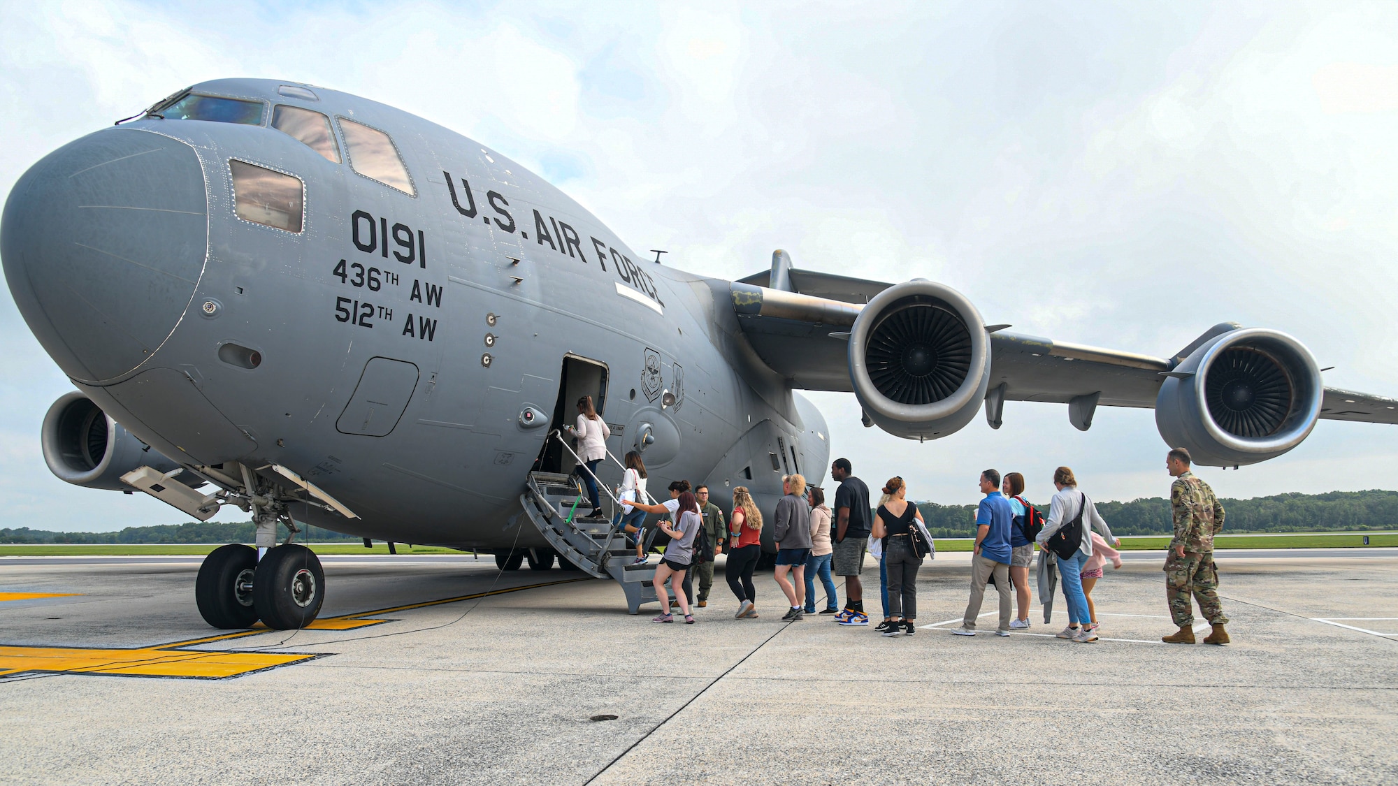 Spouses board aircraft