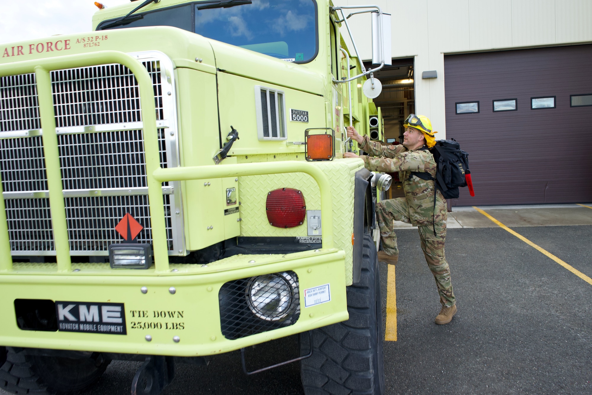 Alaska Air National Guard Staff Sgt. Anthony Hartman, 176th Civil Engineer Squadron firefighter, prepares to deploy from Joint Base Elmendorf-Richardson to Interior Alaska Aug. 6, 2023, to fight wildfires.