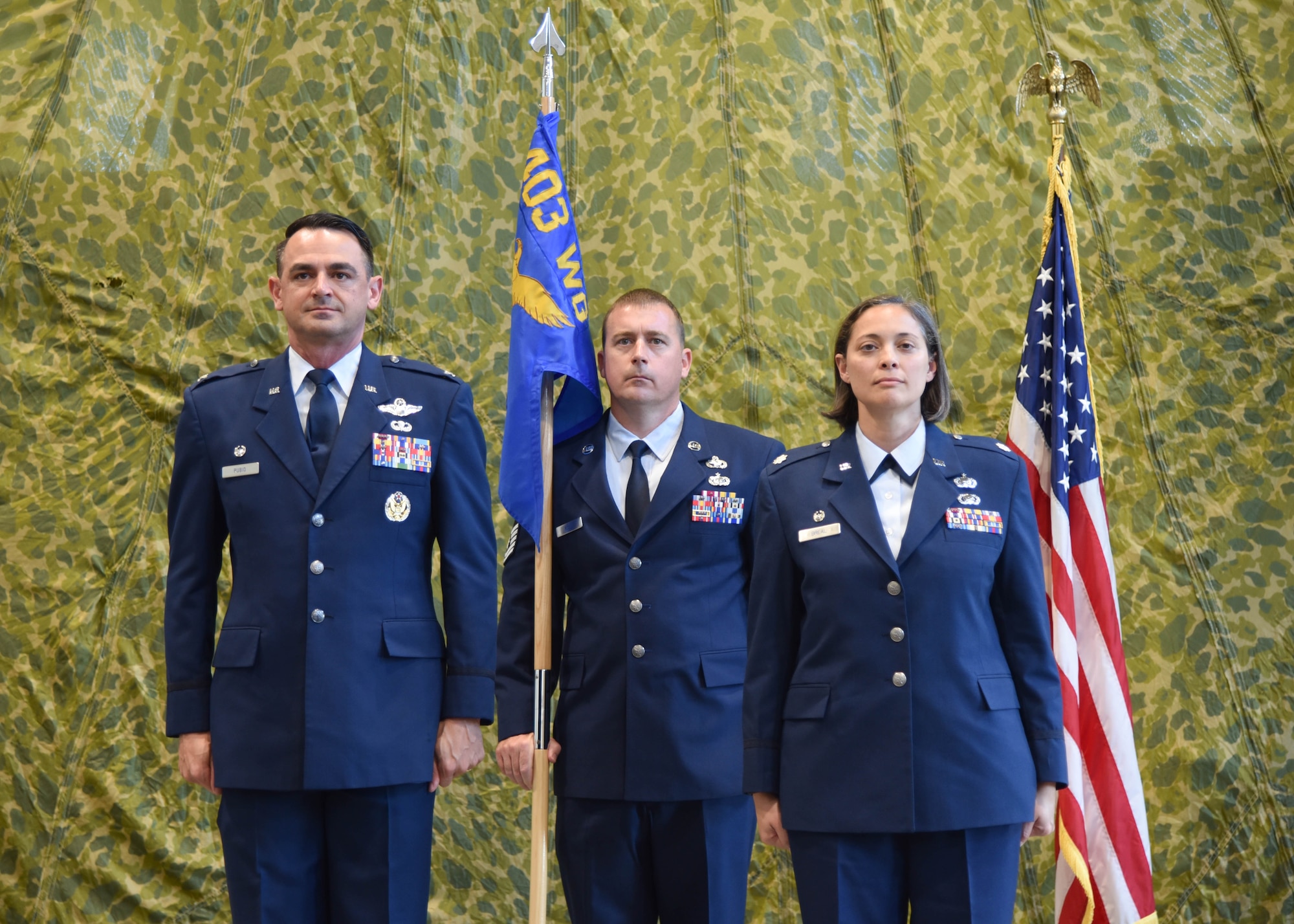 Officers at attention during assumption of command ceremony.