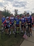 Illinois Air National Guard Senior Master Sgt. David Schreffler (center) poses with some of the Polish riders who participated in the Gold Star Mission’s Gold Star 500 bicycle ride last September in Illinois.