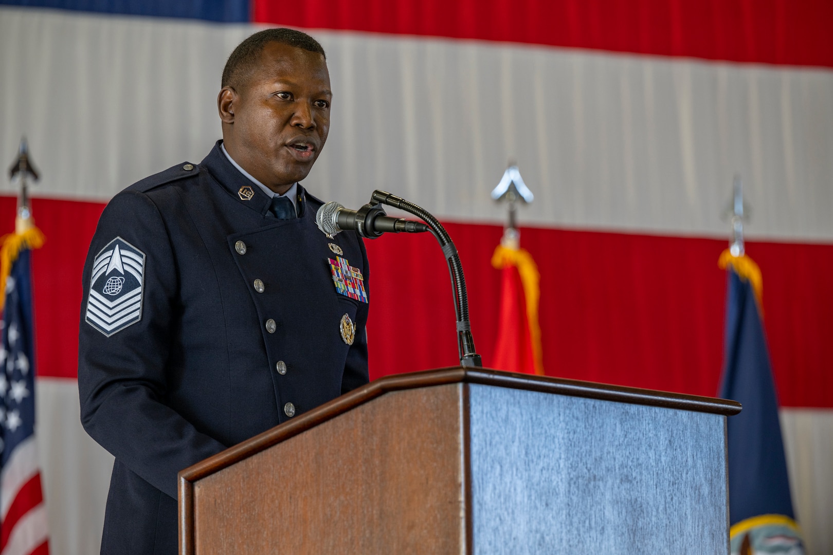 U.S. Space Force Chief Master Sgt. Jacob Simmons speaks during a change of responsibility ceremony Aug. 7, 2023, at Peterson Space Force Base, Colo.