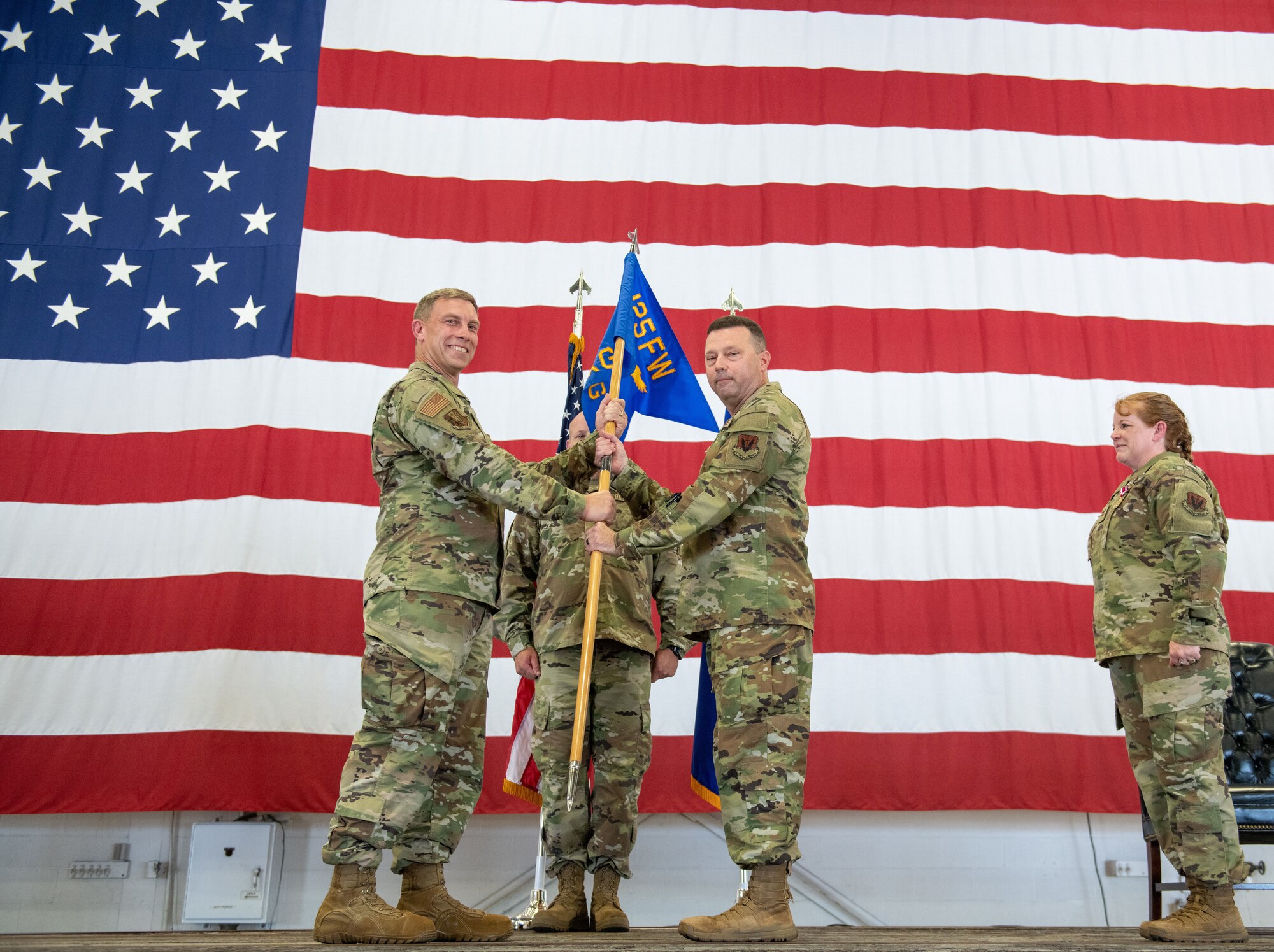U.S. Air Force Col. Carl "Rich" Guckenberger assumed command of the 125th Maintenance Group from outgoing commander, Col. Deborah Garrett, at a change of command ceremony held Aug. 5, 2023 at the 125th Fighter Wing. Guckenberger previously served as the 125th MXG deputy commander from 2016 to 2023. (U.S. Air National Guard photo by Tech Sgt. Chelsea Smith)
