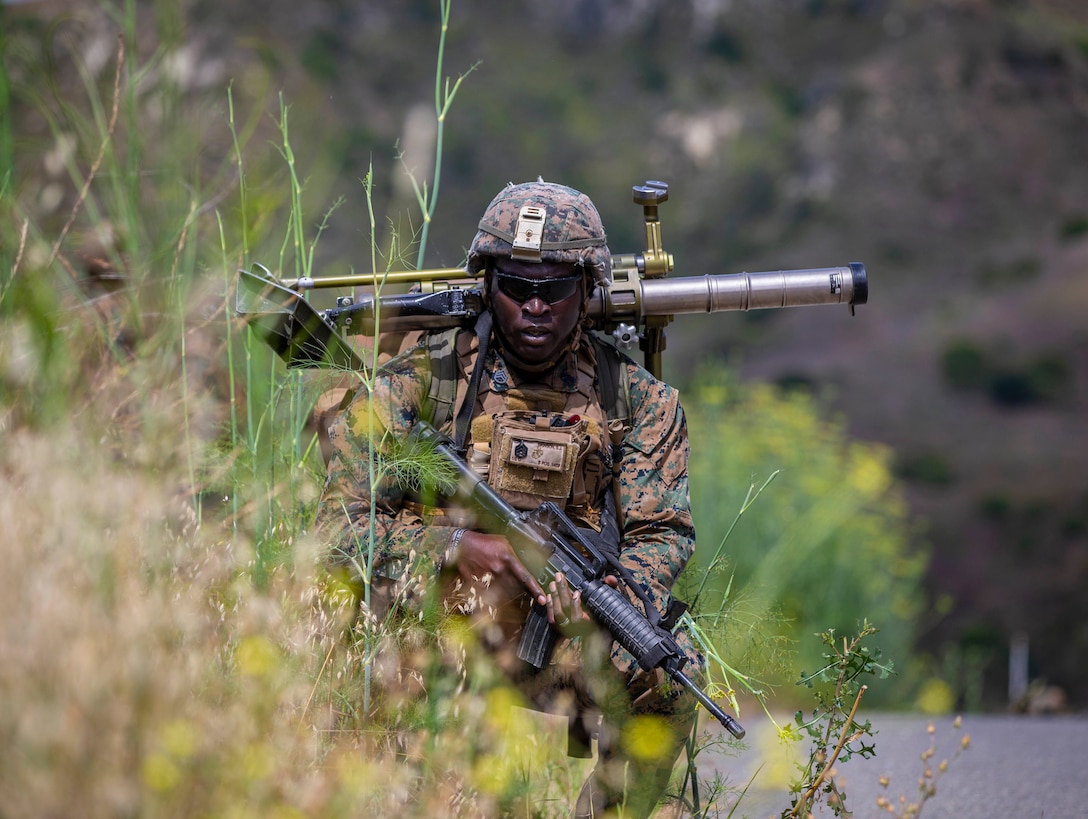 U.S. Marine Staff Sgt. Steven Dawson, a 60mm mortar assistant gunner with the Infantry Unit Leader Course, Advanced Infantry Training Battalion, School of Infantry - West, sets up post at Mortar Position 6 on Marine Corps Base Camp Pendleton, California, June 30, 2020. Marines with IULC utilized various weapons systems during the training to increase proficiency and readiness. The Marines participating in the course will leave as 0369 infantry unit leaders. (U.S. Marine Corps photo by Lance Cpl. Andrew Cortez)