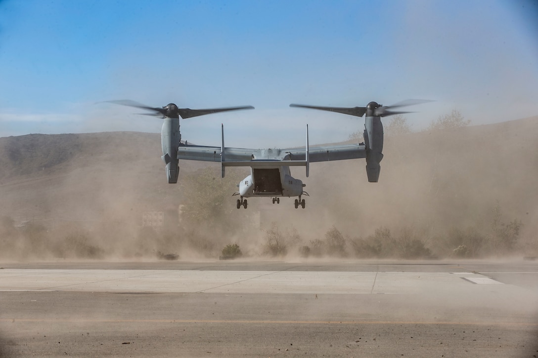 A U.S. Marine MV-22B Osprey takes off carrying students with Infantry Small Unit Leaders Course 1-22, Advanced Infantry Training Battalion, School of Infantry - West, as part of a training exercise on Marine Corps Base Camp Pendleton, California, Nov 16, 2021. The students conducted an aerial assault which took them from SOI-West on Camp Pendleton to Yuma, Arizona. ISULC is designed to teach noncommisioned officers advanced infantry skills and equip them to assume more leadership responsibility within an infantry battalion. (U.S Marine Corps photo by Cpl. Drake Nickels)