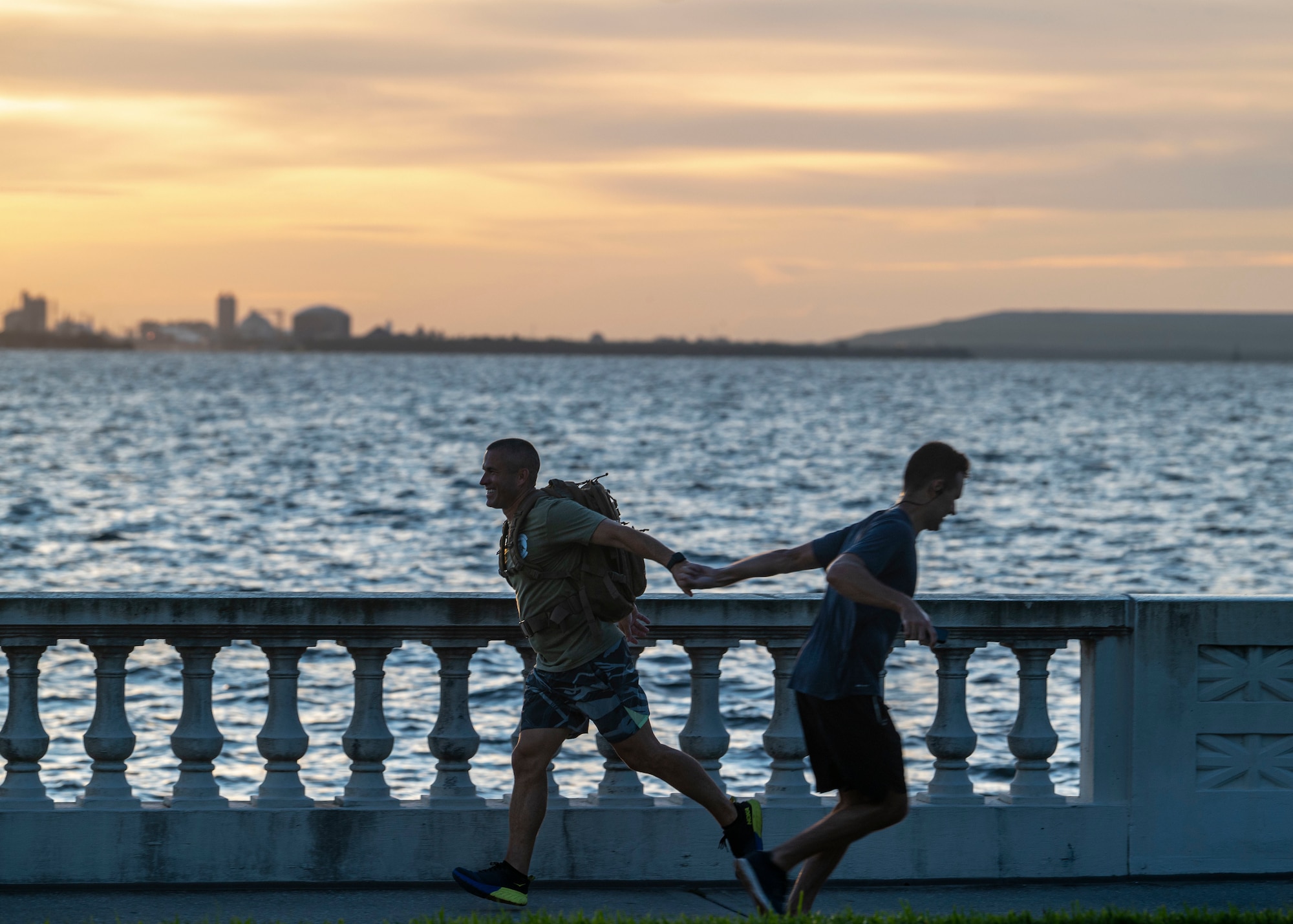 Airmen assigned to the 91st and 50th Air Refueling Squadron's participate in a 9/11 memorial run in Tampa, Florida, Sept. 9, 2022. During the event, Airmen ran 9.11 miles to honor the victims of the 9/11 attacks and strengthen group cohesion among both flying squadrons. (U.S. Air Force photo by Airman 1st Class Lauren Cobin)