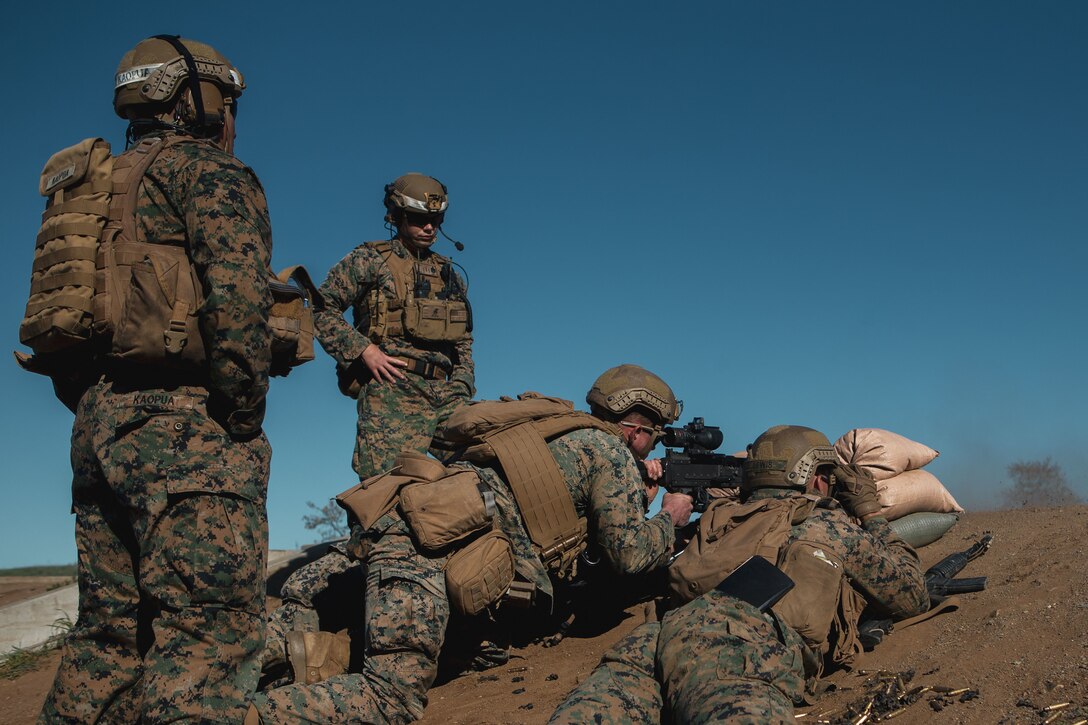 U.S. Marines with the Advanced Machine-Gun Course, fire an M240G medium machine gun during a live-fire exercise at Range 218 on Marine Corps Base Camp Pendleton, California, Feb. 16, 2022. AMGC is a six-week course where machine gunners advance their warfighting and weaponry skills, as well as their land navigation and small unit leadership. (U.S. Marine Corps photo by Lance Cpl. Shaina Jupiter)