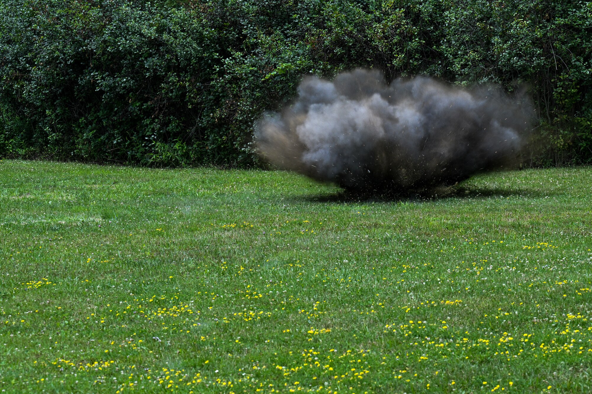 A grenade detonates during the Air Force Reserve Command Integrated Defense Leadership Course on July 21, 2023, at Camp James A. Garfield Joint Military Training Center, Ohio.