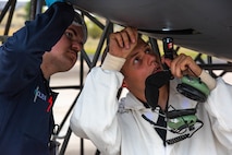 Senior Airman Dawson Holien (left), 5th Aircraft Maintenance Squadron crew chief, and U.S. Air Force Staff Sgt. Randy Davis, 5th Aircraft Maintenance Squadron maintenance apprentice, inspect the engine of a B-52H Stratofortress during the Global Strike Challenge at Minot Air Force Base, North Dakota, Aug. 4, 2023. The Global Strike Challenge is the world’s premier bomber competition that includes units from Air Force Global Strike Command, Air Combat Command, Air Force Reserve Command, and the Air National Guard. (U.S. Air Force photo by Airman 1st Class Kyle Wilson)